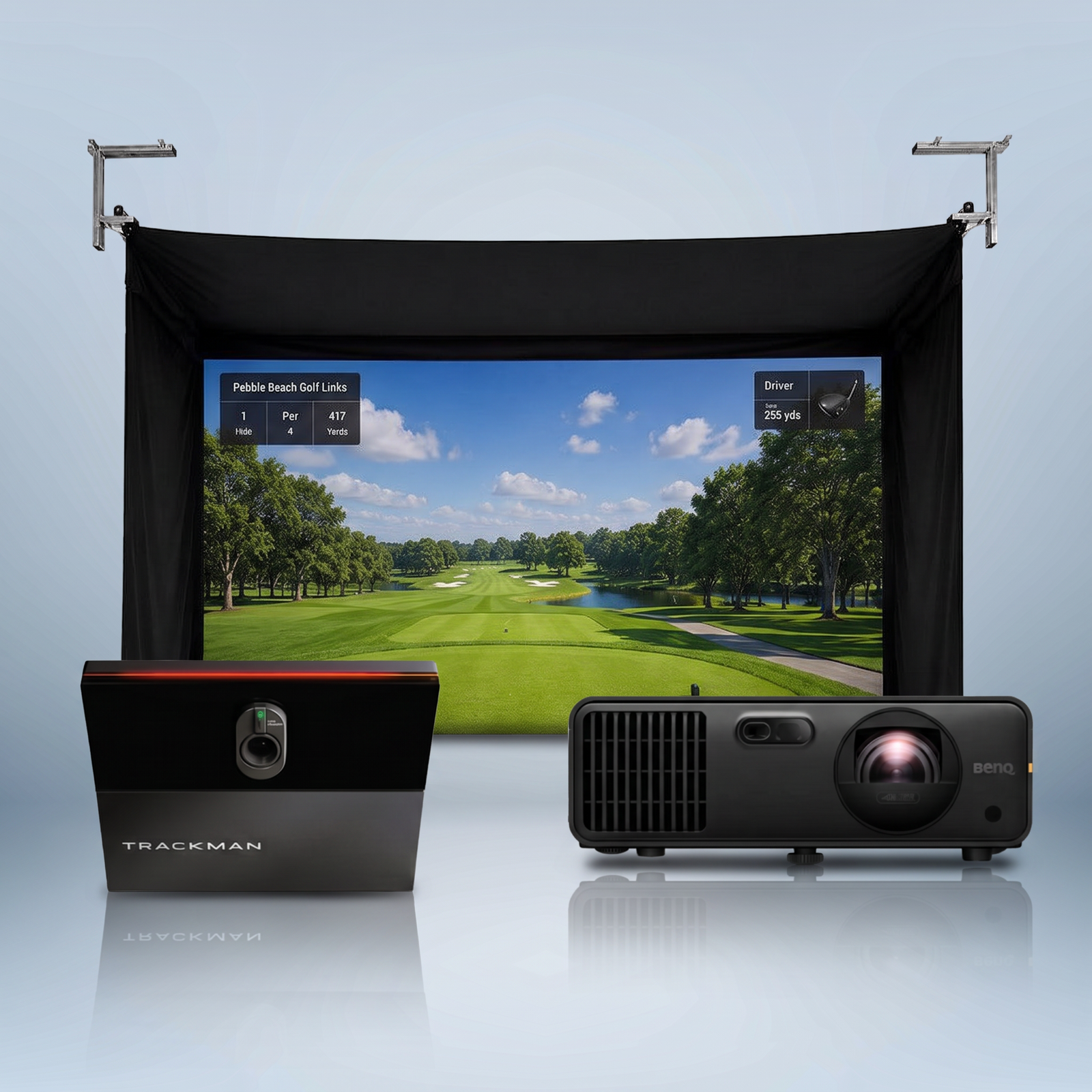 TrackMan iO SportScreen Vanish golf simulator package hero on a blue studio background.