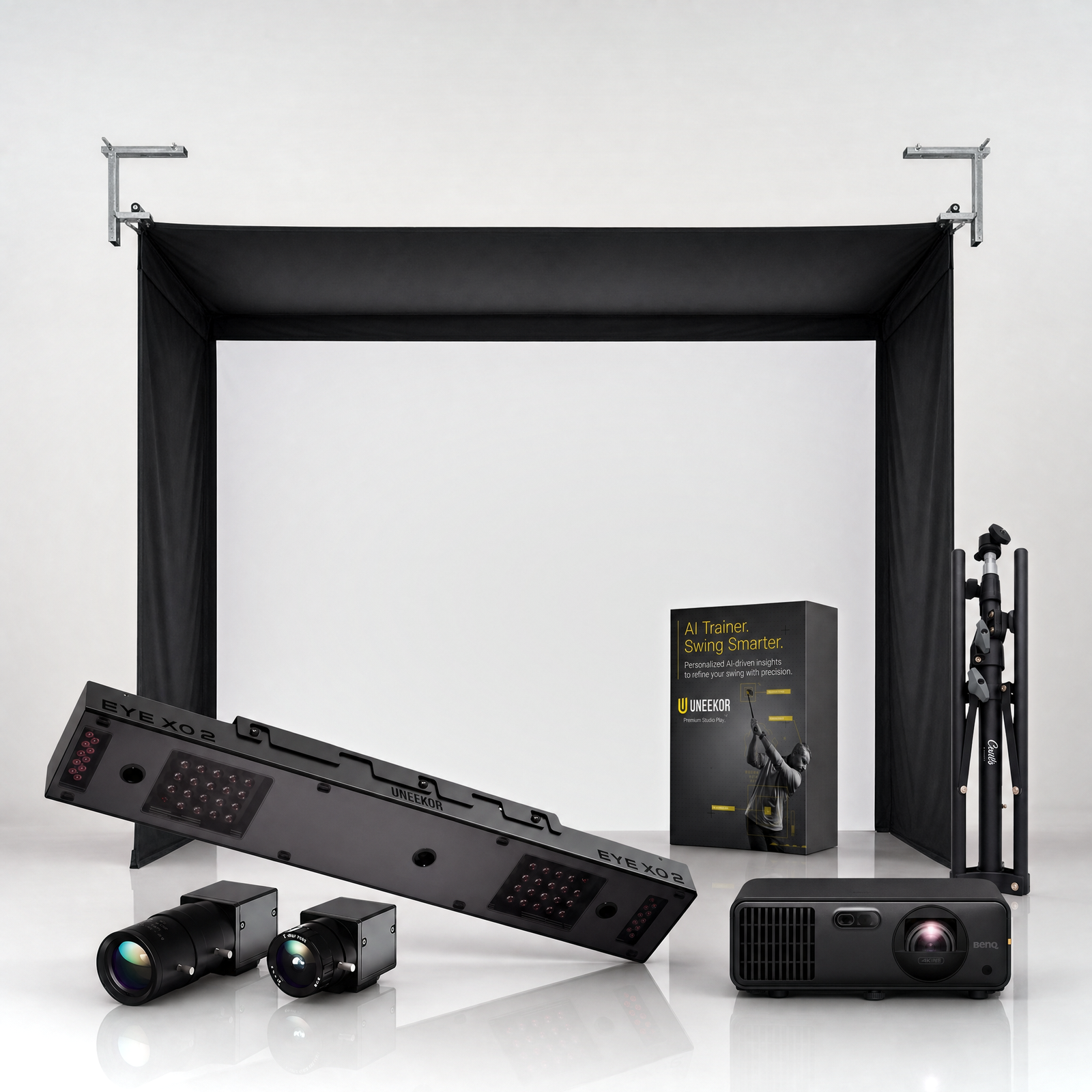 Uneekor EYE XO2 SportScreen Vanish golf simulator package hero on a grey studio background.